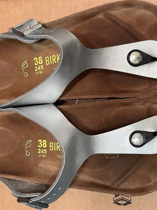 Birkenstock Shoes - Birkenstock Gizeh thong sandals in silver, featuring a metallic Birko-Flor upper